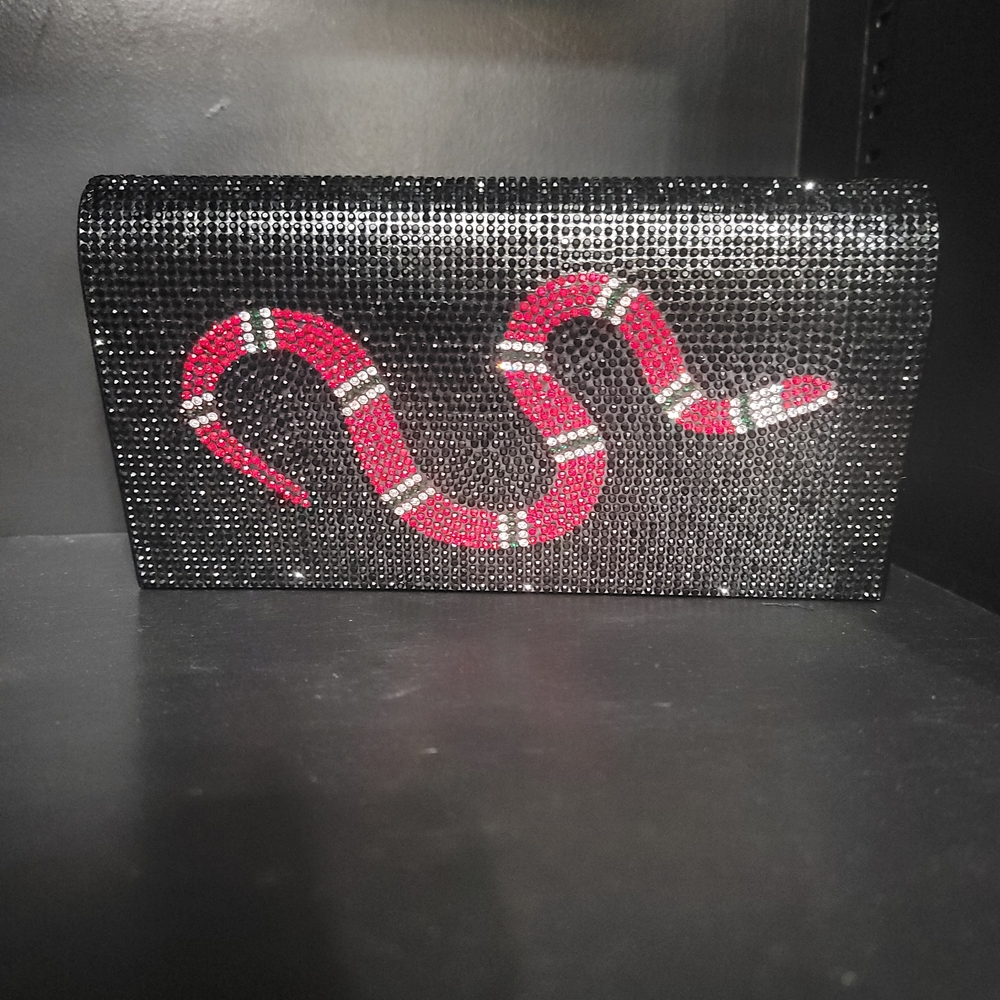 Elegant Black and Red Snake Clutch